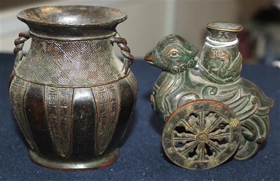 A Chinese small bronze phoenix vase and an archaistic bronze vase, 17th / 18th century, 8.8 and 9.5cm (2)